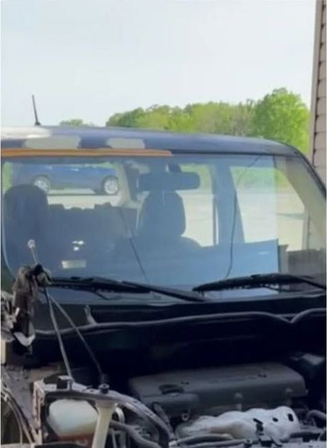 The same Scion xB stripped to the front structure during teardown